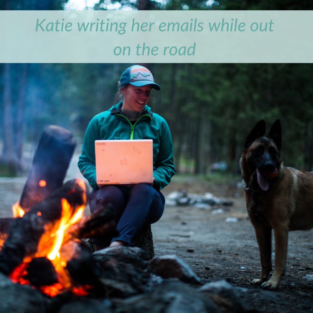 Katie writing her emails while out on the road.